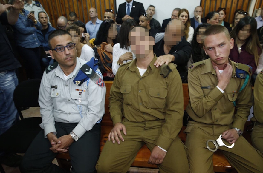 The Israeli soldier who shot a Palestinian attacker in Hebron arriving to a hearing at a military court near Kiryat Malachi, Israel, March 29, 2016. (Pool/Flash90)