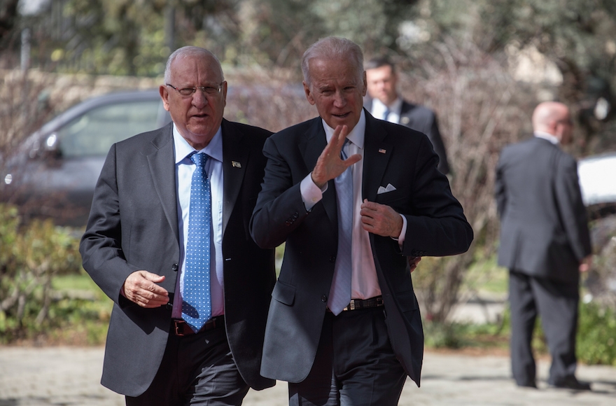 Vice President Joe Biden, right, walking with Israeli President Reuven Rivlin down the red carpet as they prepare to give a press conference in the Israeli presidential residence in Jerusalem, Israel, March 9, 2016. (Ilia Yefimovich/Getty Images)