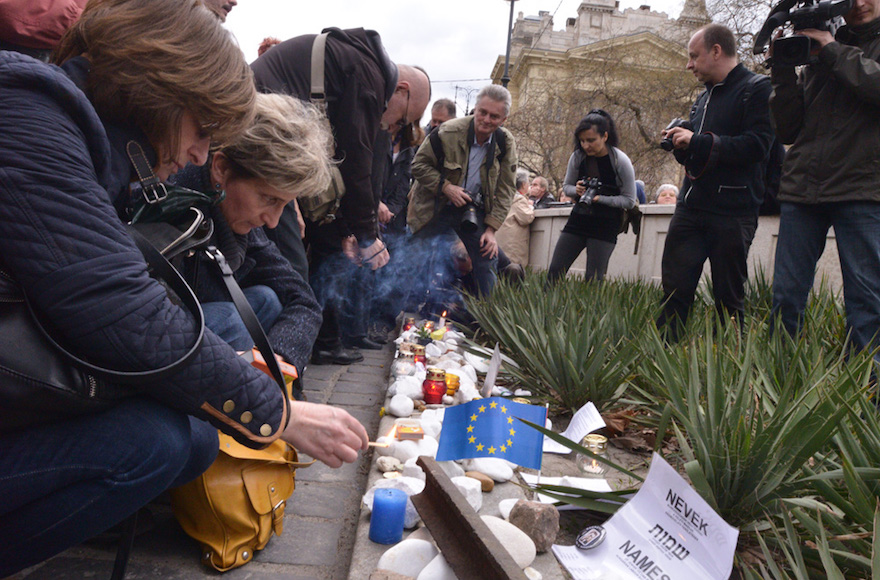 Protestors at a 2014 rally against a government plan to erect a statue in Budapest about the Holocaust. (Cnaan Liphshiz). 