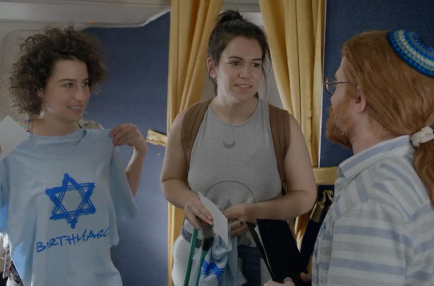 From left, Ilana Glazer, Abbi Jacobson and Seth Green in an episode of 