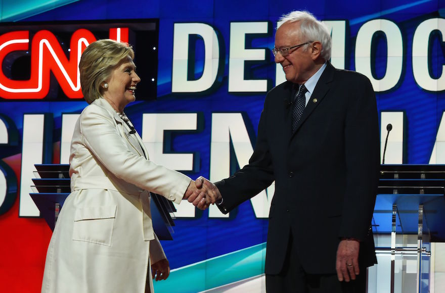 Hillary Clinton and Bernie Sanders at the CNN Presidential Debate at the Brooklyn Navy Yard in New York, April 14, 2016. (Jewel Samad/AFP/Getty Images)