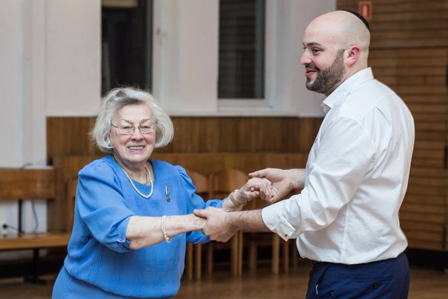 Jonny Daniels, right, dancing Foxtrot with Alicia Schnepf, secretary of the society of Polish Righteous among the Nations, in Warsaw on April 10, 2016. Courtesy of From the Depths.