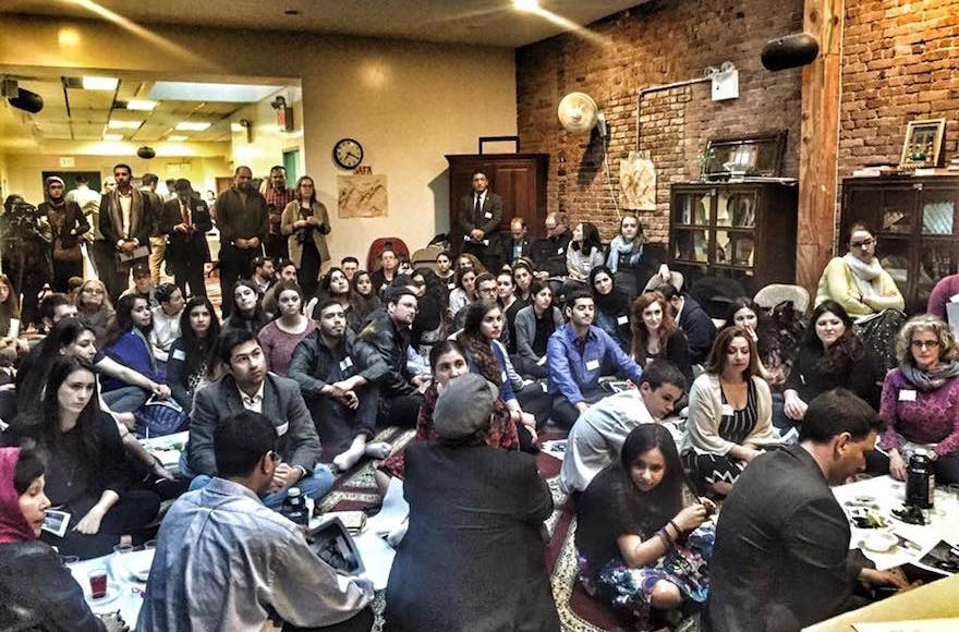 Jews and Muslims participating in a seder at the Islamic Society of Mid-Manhattan, organized by the NYC Muslim-Jewish Solidarity Committee, April 14, 2016. (Facebook)