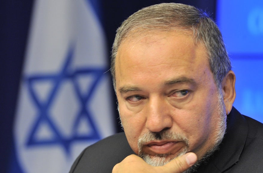 Avigdor Lieberman looking on during a press conference with the Cypriot Foreign Affairs Minister, the European Union Commissioner for Enlargement and the European Neighbourhood Policy adviser, on July 24, 2012, at the EU Headquarters in Brussels, following an EU-Israel Association Council meeting. In the meetings, Foreign Minister Liberman and EU partners will discuss strengthening the ties between Israel and the EU as well as bilateral issues, and developments in the Middle East and their impact on the region. (Georges Gobet/AFP/GettyImages)