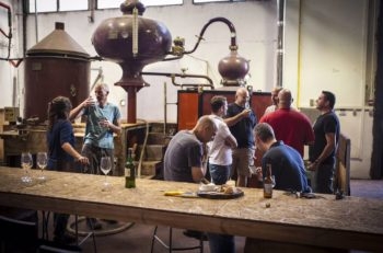 Pelter Winery is also distills whiskey and other spirits. The still, in the background, is from Cognac, France, and was once used by Remy Martin. (Courtesy of Pelter Winery)