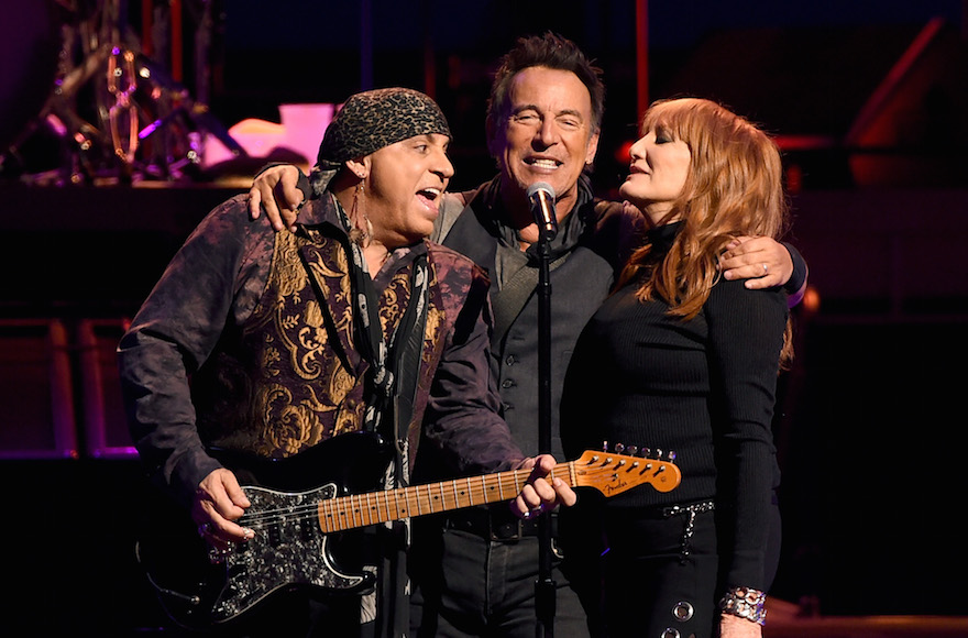 Steven Van Zandt, left, Bruce Springsteen and Patti Scialfa of Bruce Springsteen and the E Street Band performing at the Los Angeles Sports Arena in Los Angeles, California, March 15, 2015. (Kevin Winter/Getty Images)
