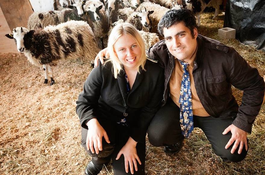 Gil and Jenna Lewinsky posing with their "biblical sheep" (Facebook)