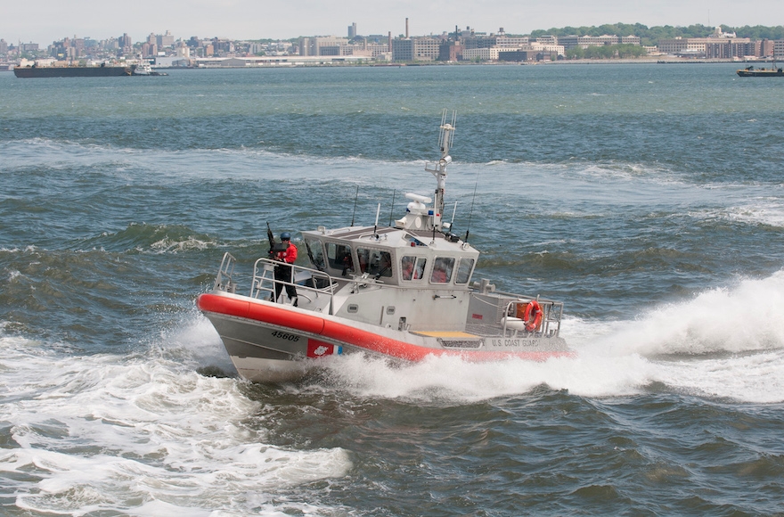 A U.S. Coast Guard vessel patrolling New York Harbor, New York City. (Education Images/UIG via Getty Images)