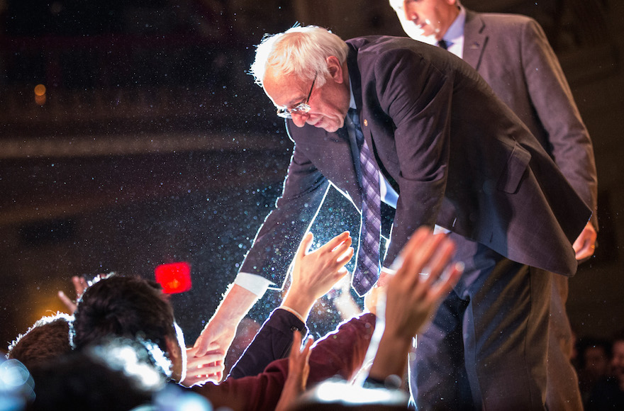 Bernie Sanders, I-Vt., shaking hands with supporters after outlining his plan to reform the U.S. financial sector in New York City, Jan. 15, 2016. (Andrew Burton/Getty Images)