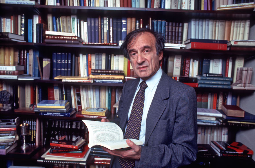 Elie Wiesel, author of over 50 books, in his study at home in New York, New York, Oct. 14, 1986. (Allan Tannenbaum/Getty Images)