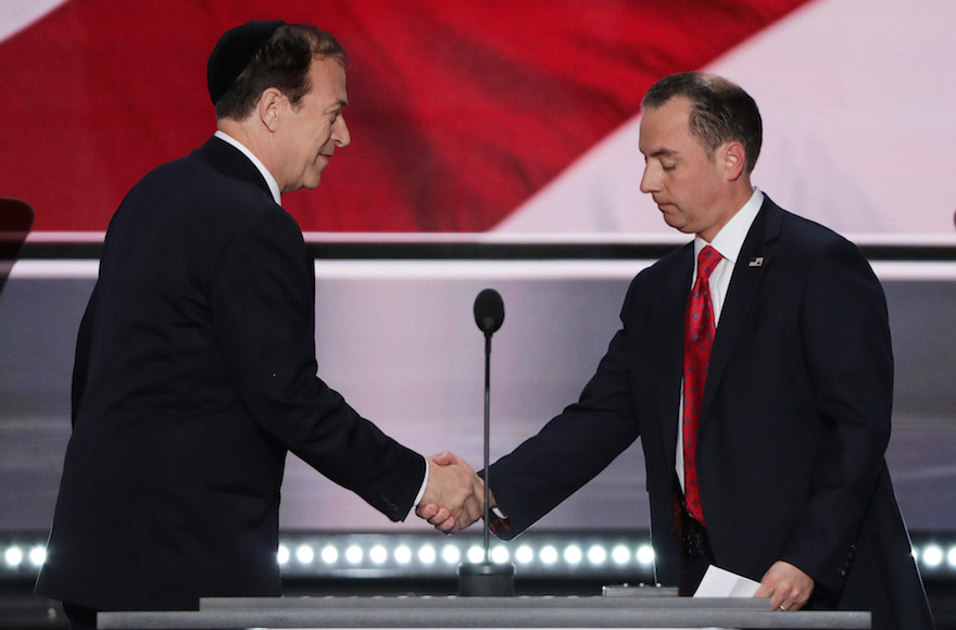 Rabbi Ari Wolf, shaking hands with Reince Priebus, chairman of the Republican National Committee, during the start of the first day of the Republican National Convention at the Quicken Loans Arena in Cleveland, Ohio, July 18, 2016. (Alex Wong/Getty Images)