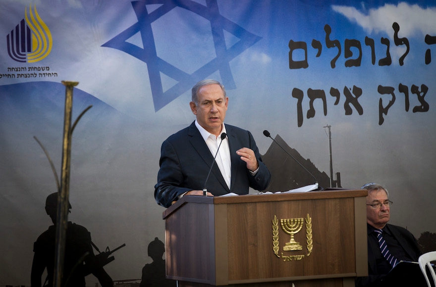 Minister Benjamin Netanyahu speaking at a ceremony marking two years since Operation Protective Edge at the Mount Herzl military cemetery in Jerusalem, July 26, 2015. (Miriam Alster/Flash90)