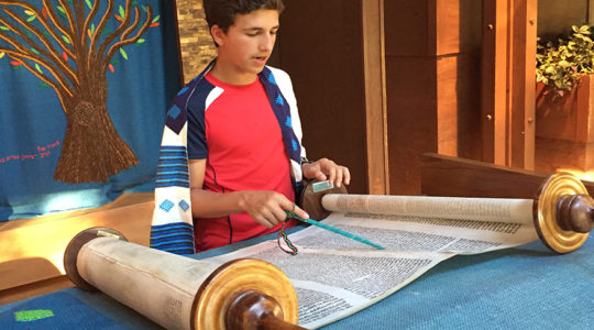 Alex Schapiro studying for his Bar Mitzva at the Spanish Synagogue of PRague in 2016. (Photo courtesy of Andrew H. Schapiro.