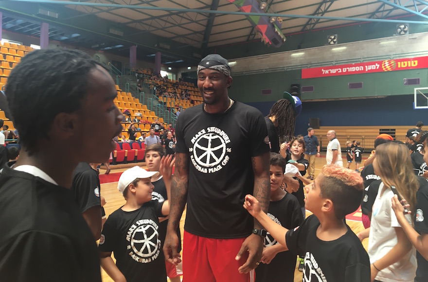 Amare Stoudemire leading a kid's basketball camp in Jerusalem, Aug. 8, 2016 (Andrew Tobin)