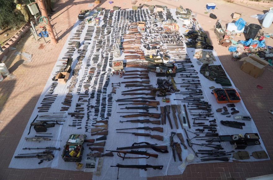 Dozens of illegal weapons seized by Israeli security forces in Bethlehem and Hebron being displayed, Aug. 23, 2016. (Courtesy of IDF Spokesperson’s Unit)