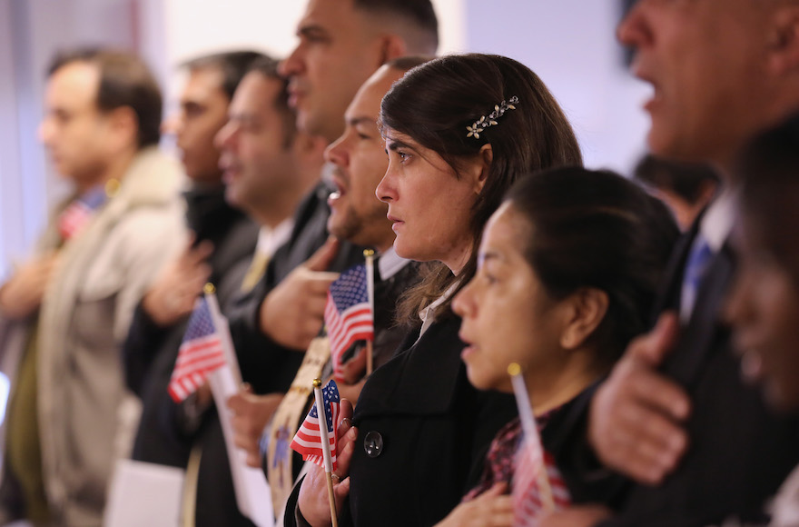 Immigrants being sworn in