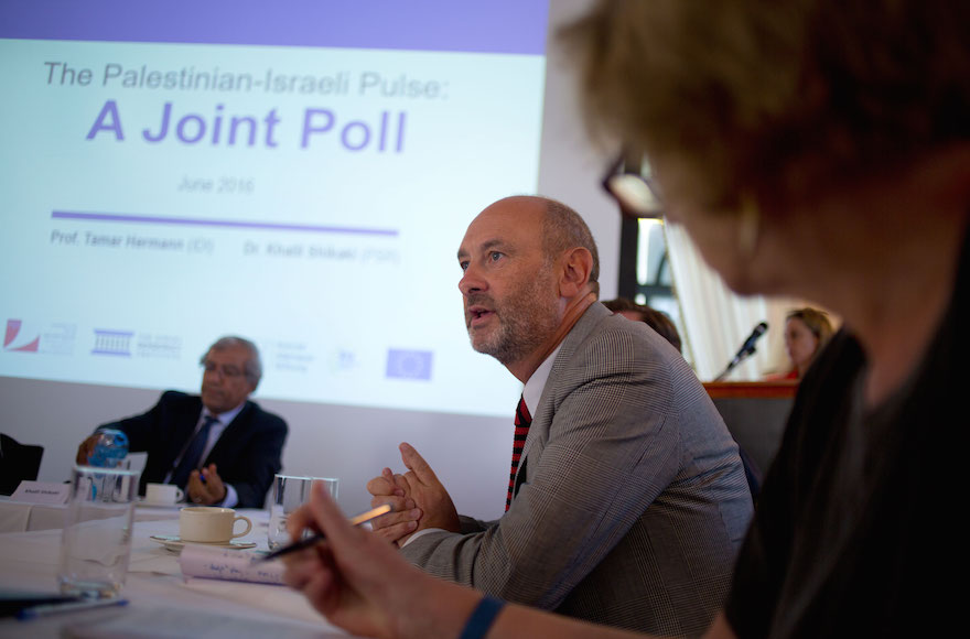 Khalil Shikaki speaking at the conference announcing the findings of the joint poll at the American Colony Hotel in Jerusalem, Aug. 22, 2015 (Courtesy of IDI) 