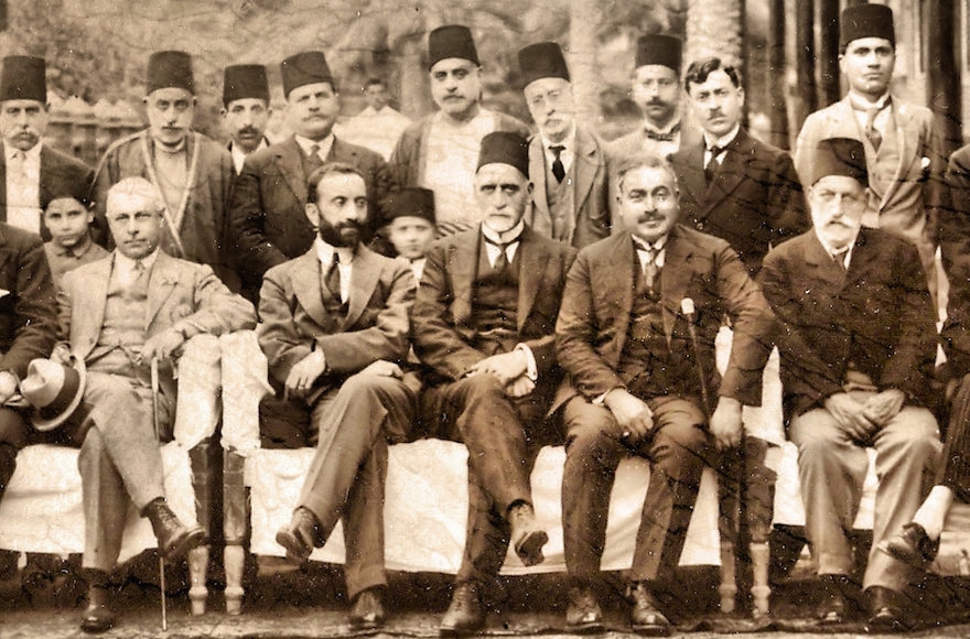 King Faisal I with Sassoon Eskell on an official tour of duty in Baghdad. (Wikimedia Commons)