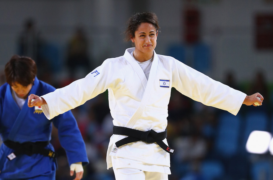 Yarden Gerbi of Israel celebrating victory over Miku Tashiro of Japan during the women's bronze medal judo bout on day four of the Rio 2016 Olympic Games at the Carioca Arena in Rio de Janeiro, Aug. 9, 2016. (Ryan Pierse/Getty Images)