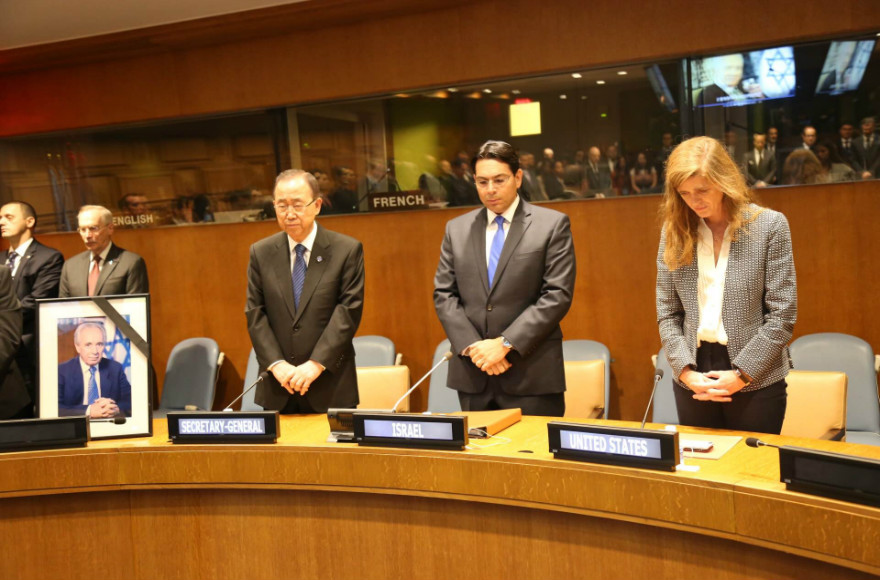 Danny Danon, Israel's ambassador to the United Nations, center, leads a memorial service to former Israeli President Shimon Peres attended by some 40 diplomats at the United Nations headquarters in New York on Sept. 29, 2016. 