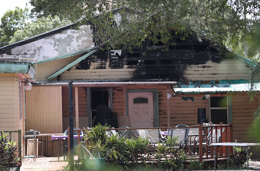 Law enforcement officials investigating a fire at the Islamic Center of Fort Pierce in Fort Pierce, Florida, Sept. 12, 2016. (Joe Raedle/Getty Images)