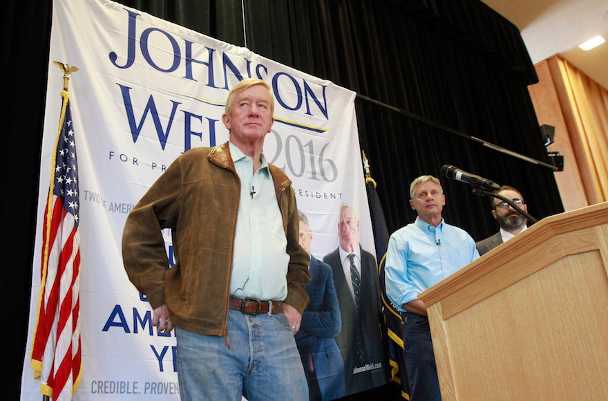 Bill Weld, left, with his running mate, Libertarian presidential candidate Gary Johnson, at a rally in Salt Lake City, Aug. 6, 2015. (George Frey/Getty Images)