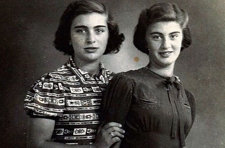 Carry Ulreich, right, and her older sister Rachel in a photograph taken their time in hiding in Rotterdam during the Nazi occupation. (Mozaïek)
