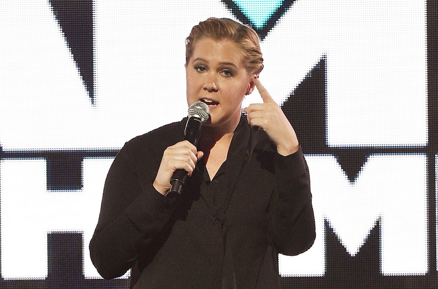 Amy Schumer speaking onstage during the Comedy Central Live 2016 upfront at Town Hall in New York City, March 31, 2016. (Bryan Bedder/Getty Images for Comedy Central)