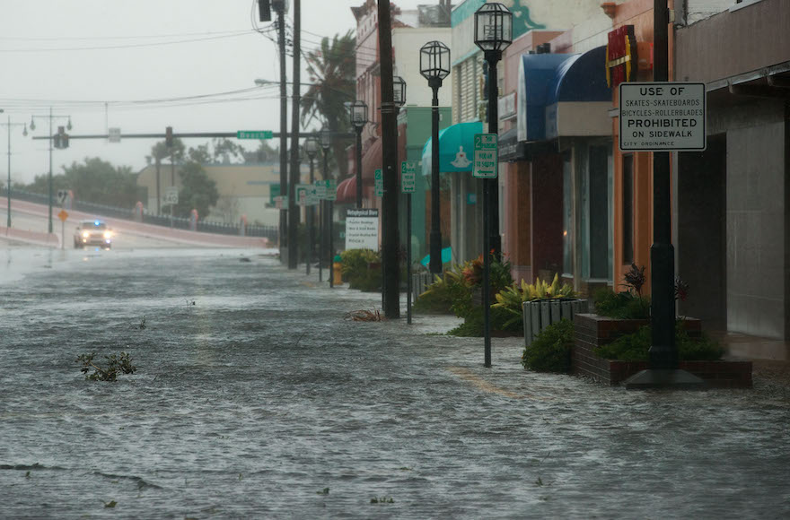 Water covering portions of the road after Hurricane Matthew passes through in Daytona Beach, Florida, Oct. 7, 2016 (Drew Angerer/Getty Images)