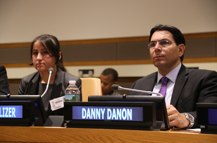 Yazidi refugee Marwa Al Aliko, left, at an event hosted by Israeli U.N. envoy Danny Danon, right. (Courtesy of Israeli Mission to the U.N.)