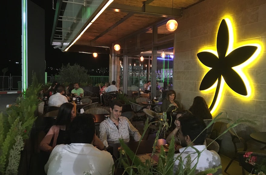 Young people hanging out at Jasmine Cafe in Nablus, West Bank, Sept. 18, 2016. (Andrew Tobin)