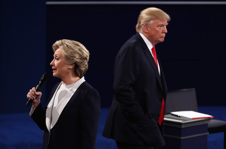 Hillary Clinton and Donald Trump participating at a town hall debate at Washington University in St. Louis, Oct. 9, 2016. (Win McNamee/Getty Images)