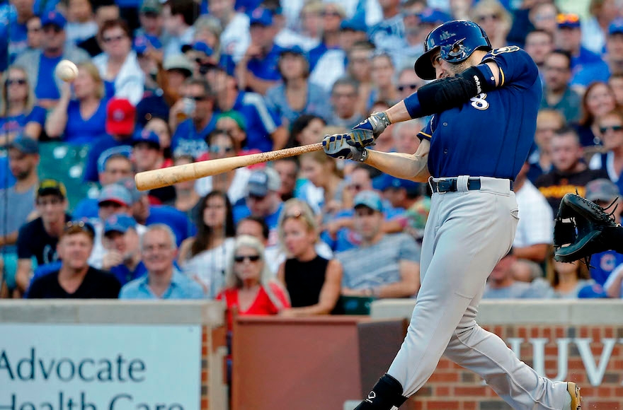 Ryan Braun hitting a home run against the Chicago Cubs in a game at Wrigley Field in Chicago, Sept. 17, 2016. (Jon Durr/Getty Images)
