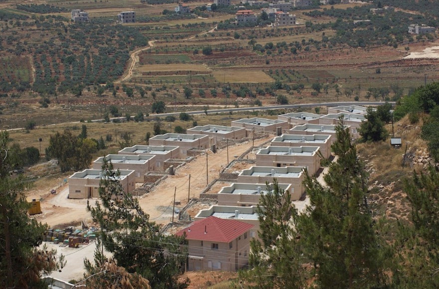 New houses being constructed in Shiloh, a Jewish settlement in the West Bank in 2013. (Ryan Simon via CC)