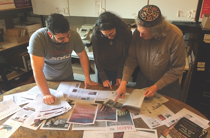 Ari Bloomekatz, Cat Zavis and Rabbi Michael Lerner working on a recent issue of Tikkun. (Courtesy of J. Weekly)