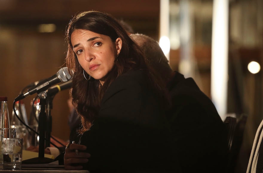 Israeli-Arab journalist Lucy Aharish moderating a pannel during the conference