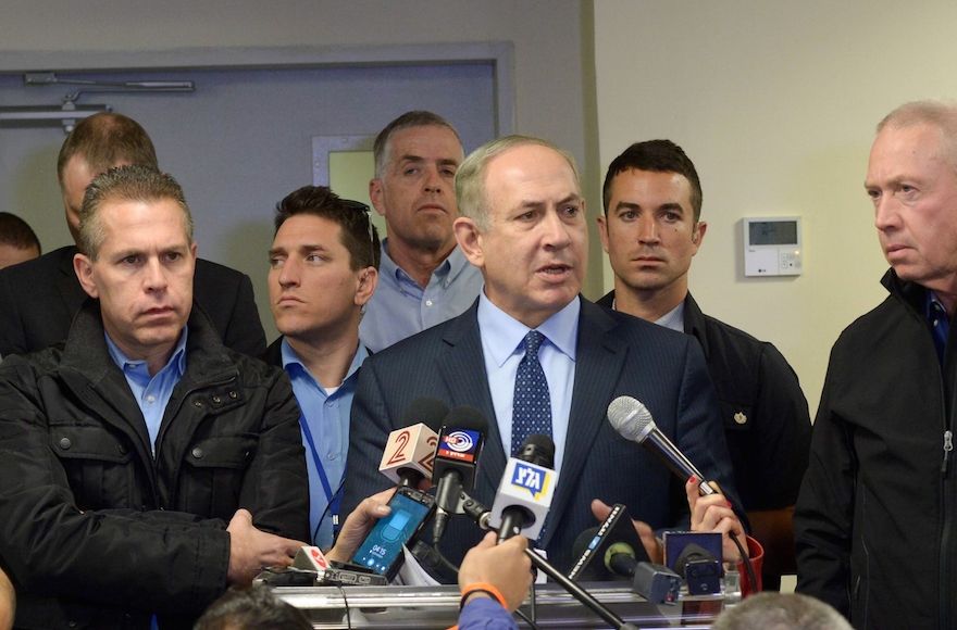 Israeli Prime Minister Benjamin Netanyahu (center), Public Security Minister Gilad Erdan (left), Israel Police Chief ROni Alsheich (rifht), Minister of Construction Yoav Galant and Minister of Interior Affairs Aryyeh Deri during a briefing in the Northern Israeli city of Haifa, where a major fire was raging, causing more than 80000 to evacuate their homes, in Haifa and the surrounding areas. November 24, 2016. Photo by Amos Ben Gershom/GPO