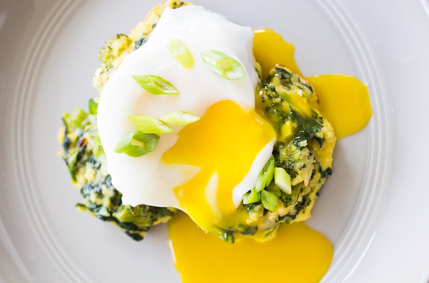 Spinach, brocolli and scallion pancakes with poached eggs (Megan Wolf)