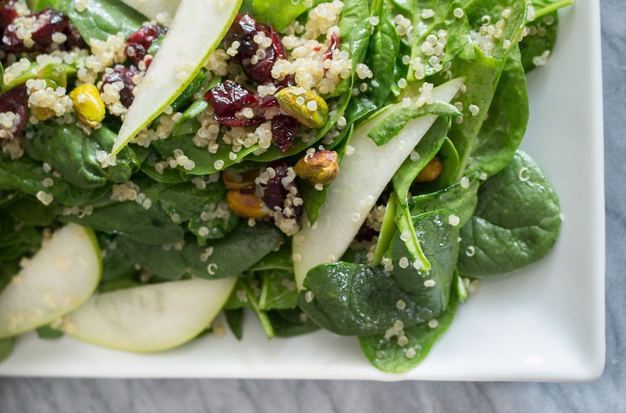 Spinach salad with quinoa, toasted pistachios and cranberries (Megan Wolf)