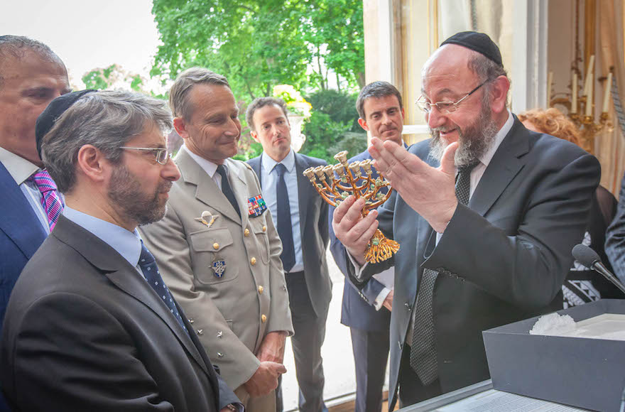 Manuel Valls, second from right, hosting French Chief Rabbi Haim Korsia, left, and his British counterpart Ephraim Mirvis in May 2015 at his office. (Eli Itkin/Conference of European Rabbis)