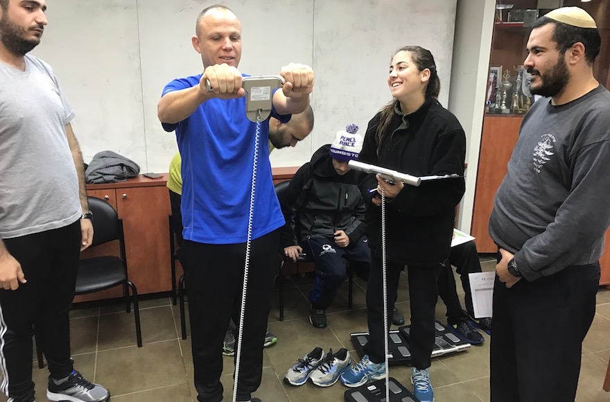 Participants in Changes of Shape weighing in on the Wingate army base in Netanya, Israel, Dec. 13, 2016. (Andrew Tobin)