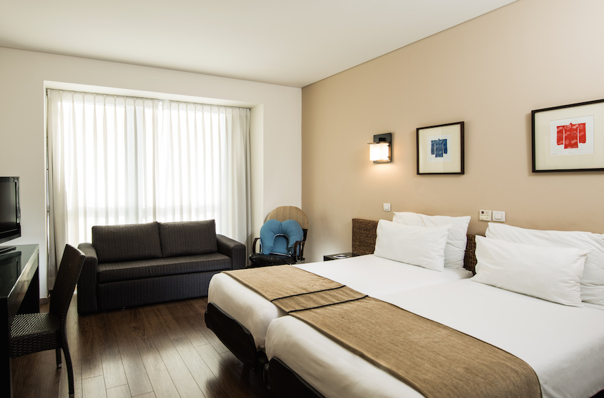 Inside one of the mini-suites at Hotel Baby Lis, which includes a sleeper sofa for mothers with older children who would also like to stay. (Courtesy of Baby Lis)