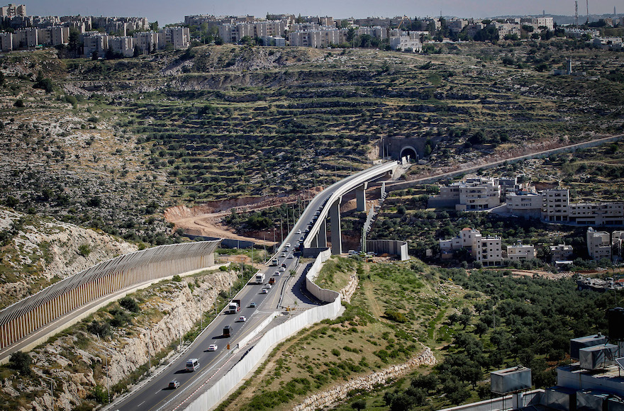 The separation barrier running near Jerusalem, April 17, 2016. (Wisam Hashlamoun/Flash90)