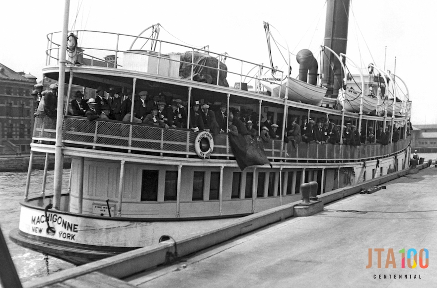Immigrants arriving at Ellis Island aboard the tender Machigonne in New York, Aug. 21, 1923. (Underwood Archives/Getty Images)