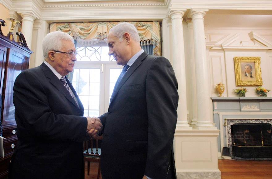 Palestinian Authority Mahmoud Abbas President, left, shaking hands with Israeli Prime Minister Benjamin before holding direct peace talks at the State Department in Washington, D.C, Sept. 2, 2010. (Jason Reed-Pool/Getty Images)