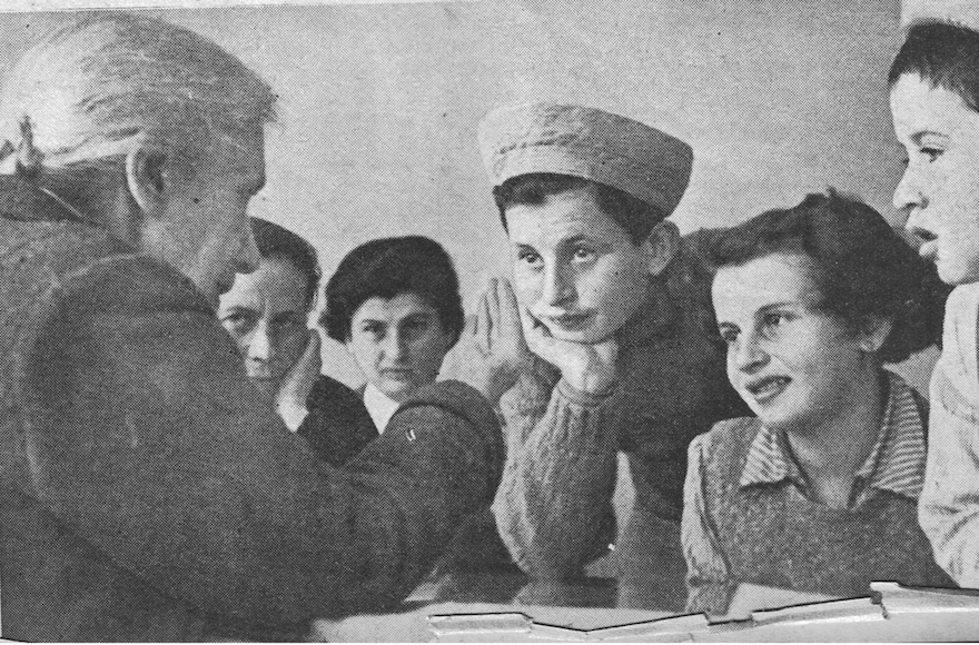 Hadassah founder Henrietta Szold meeting with Tehran Children in Israel in February 1943. (Jewish Agency for Israel)