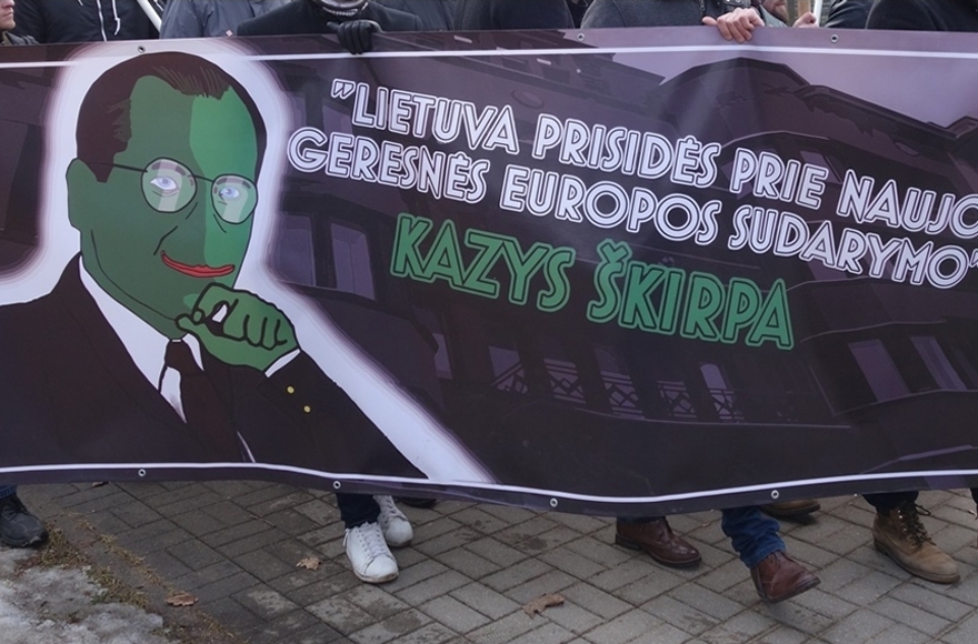 Nationalists carrying a picture merging Pepe the Frog and Kazys Skirpa in Kaunas, Lithuaia o Feb. 16, 2017. (Photo: Defending History)