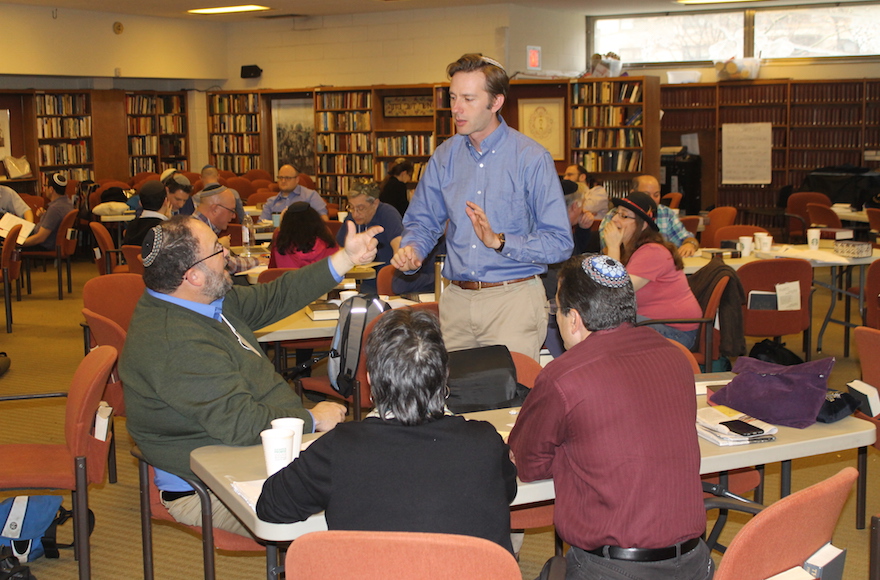 Rabbi Ethan Tucker, Hadar’s co-founder, talking with rabbis during a seminar at Hadar in Manhattan on March 1, 2017. (Ben Sales)