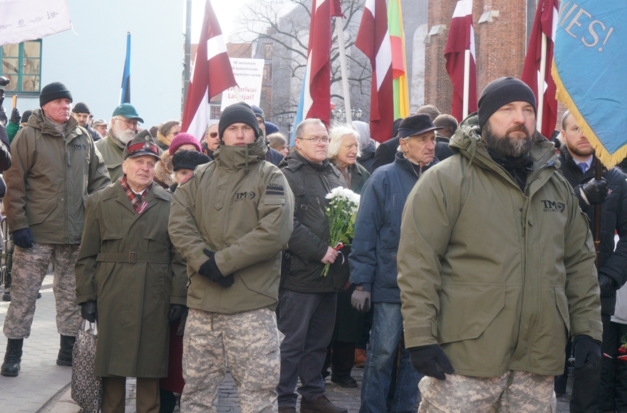 Veterans of the Latvian Legion SS unit marching with supporters through Riga, Latvia on March 16, 2018. Cnaan Liphshiz