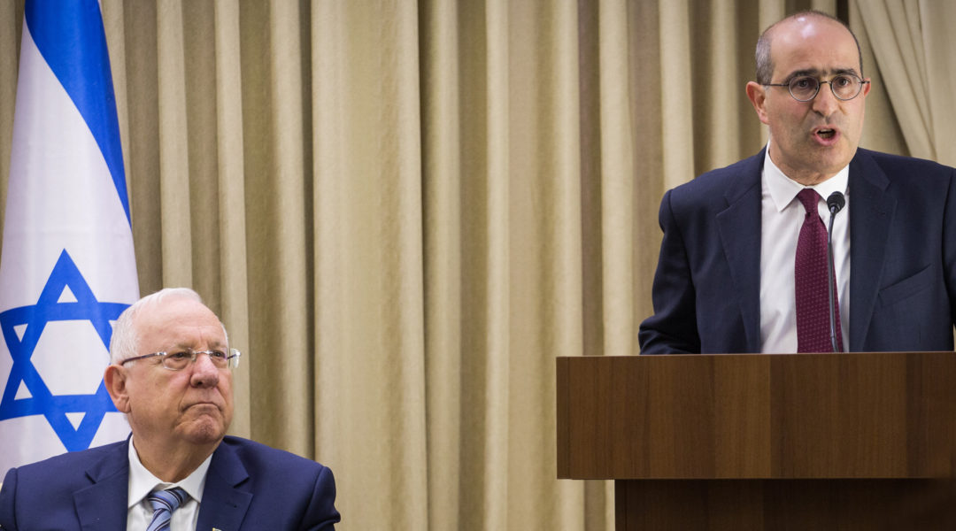 Gideon Taylor, right, speaking alongside Israeli President Reuven Rivlin in Jerusalem in 2017. Hadas Parush Flash90